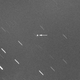 A 60-second exposure, showing the asteroid on January 17. The streaks are background stars.